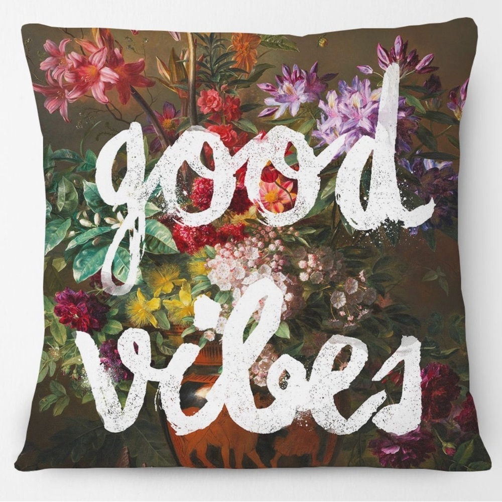 Good vibes graffiti over floral print canvas pillow cover